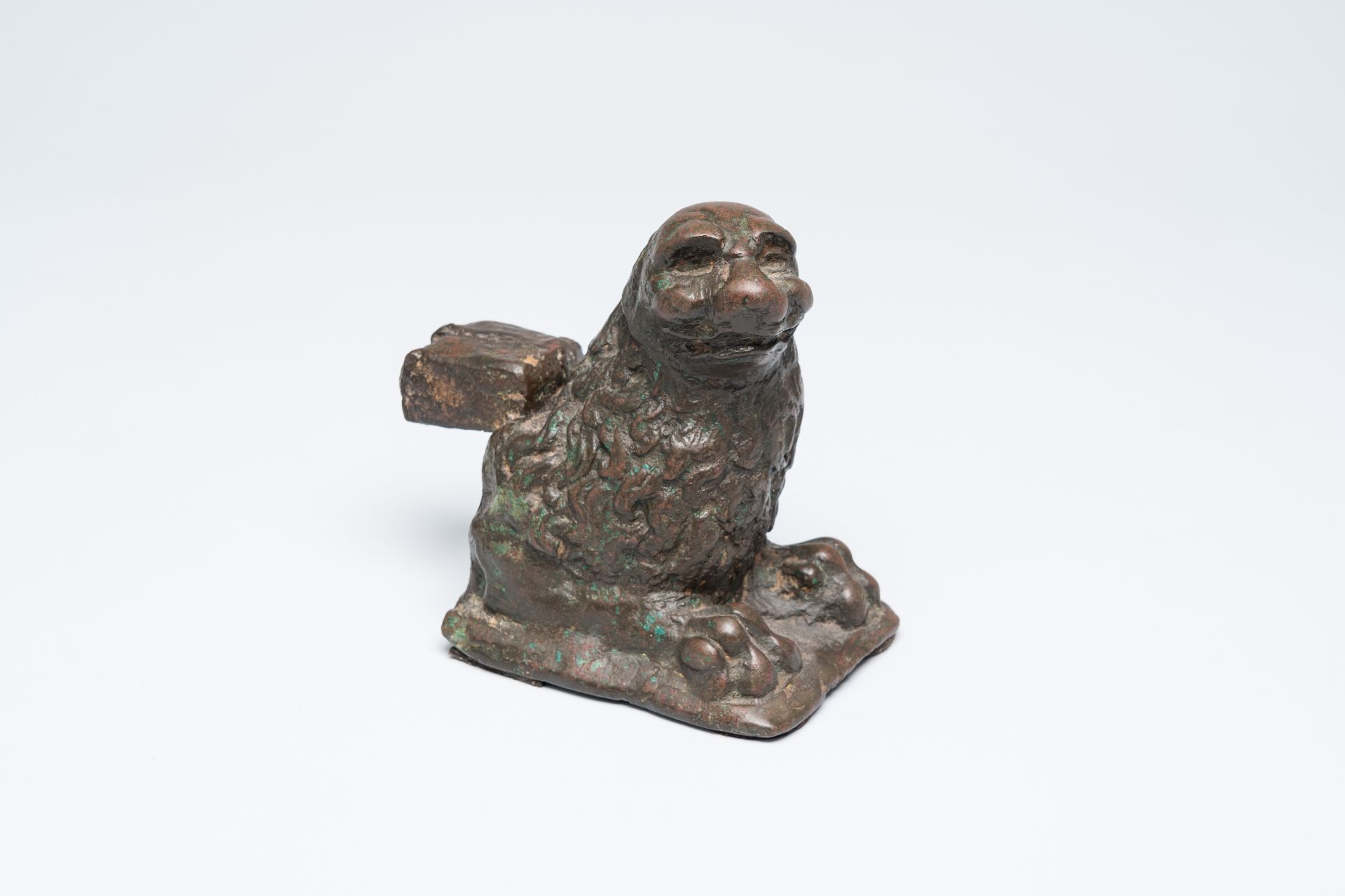 A North Italian Romanesque patinated bronze model of a lion, 13th C.