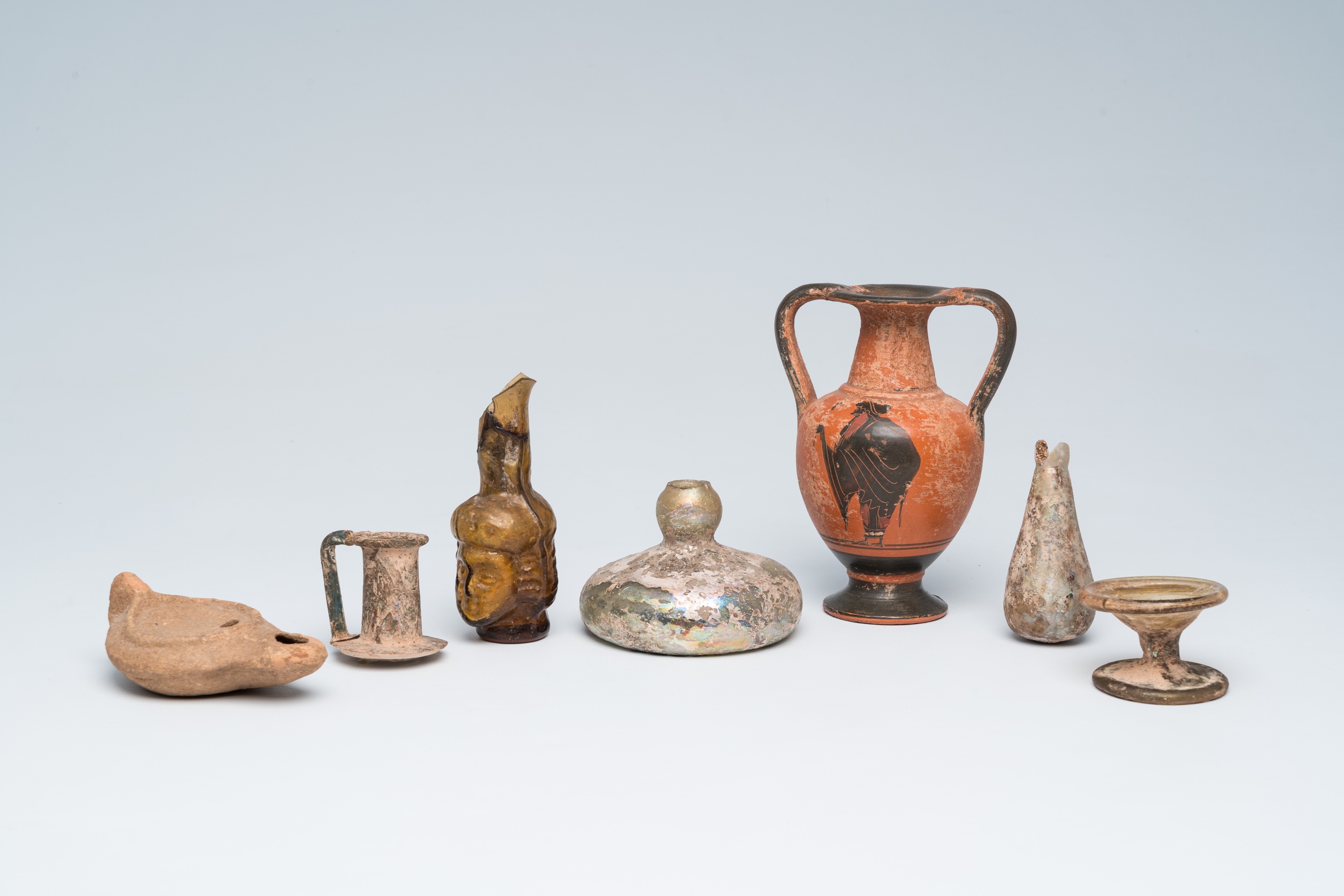 A varied collection of archaeological glass and pottery utensils and fragments, Greco-Roman period a