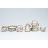 A varied collection of Chinese Canton famille rose porcelain with palace scenes and floral design, 1