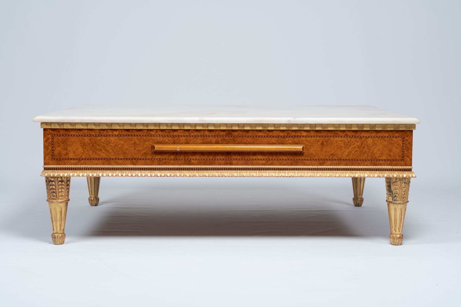 A Neoclassical partly gilt wood coffee table with marble top and four extendable plateaus, 20th C. - Image 7 of 8