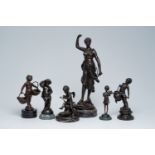 A varied collection of six French bronze sculptures on a marble base, 20th C.