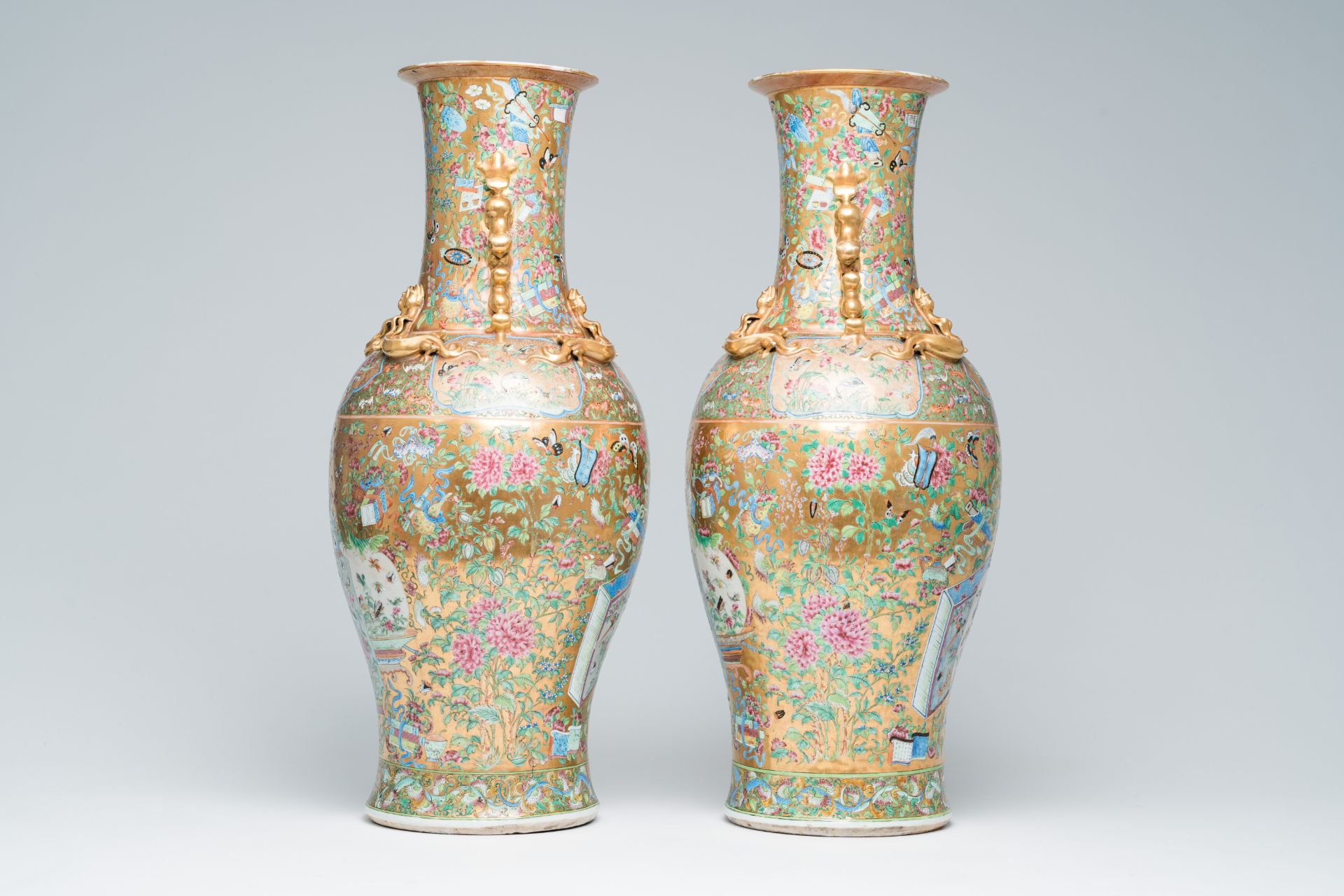 A pair of Chinese Canton famille rose gold ground vases with birds and butterflies among blossoming - Image 4 of 6