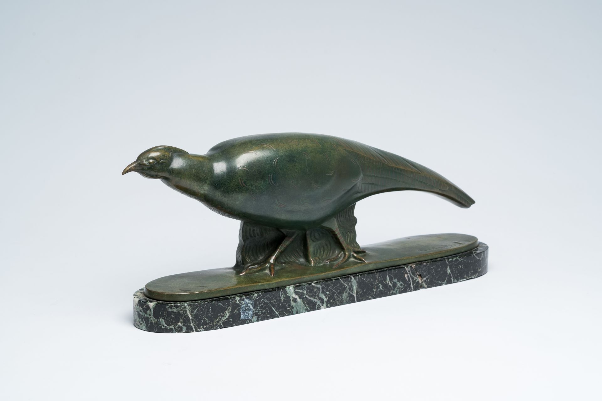 Raoul Eugene Lamourdedieu (1877-1953): Pheasant, green patinated bronze on a marble base, dated (19)