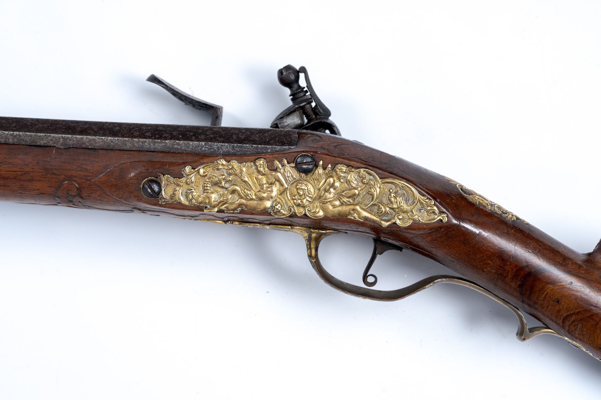 A richly worked brass mounted flint shotgun with Spanish marks, 18th C. - Image 5 of 7