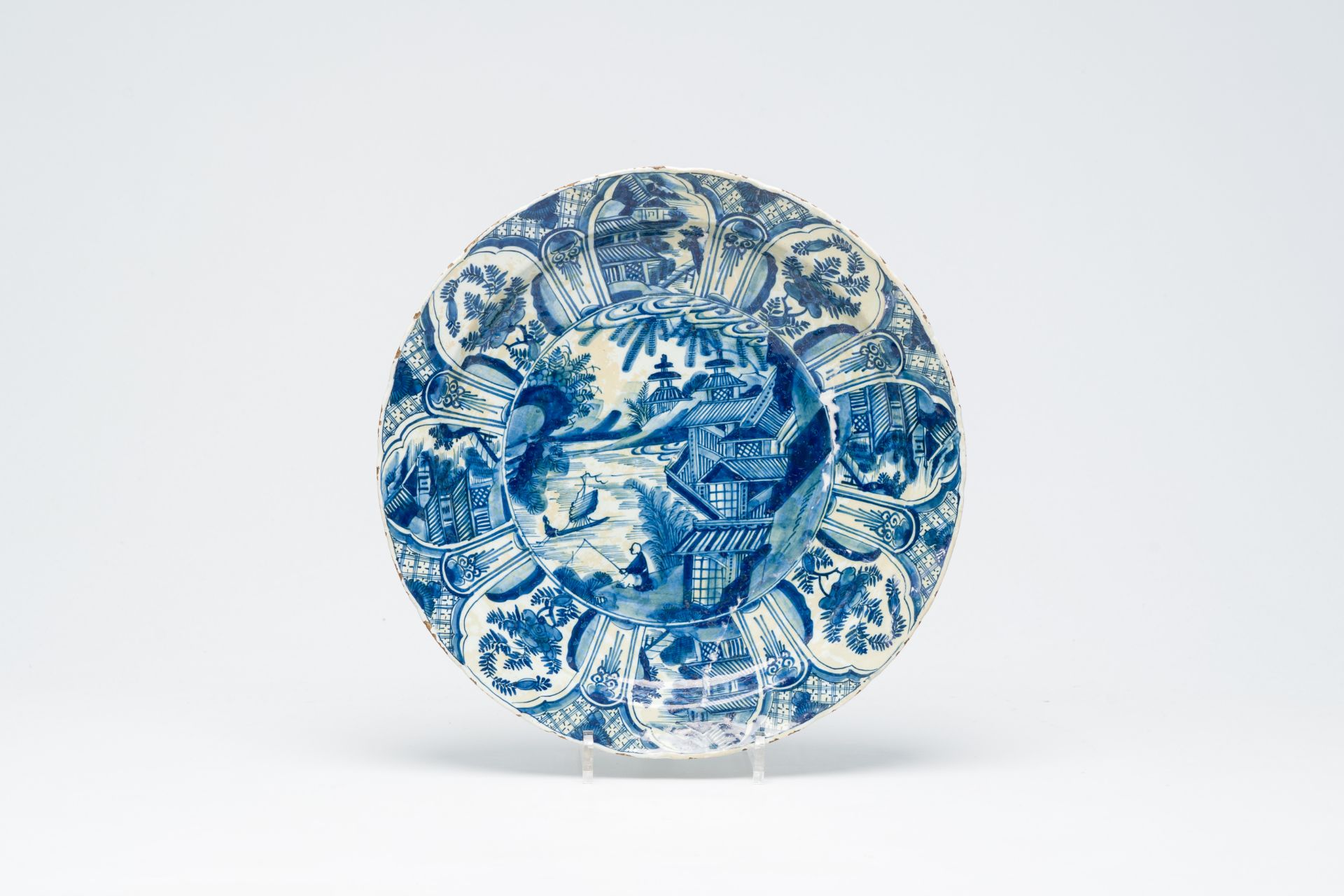 Seven Dutch Delft blue and white 'chinoiserie' dishes, 18th C. - Image 6 of 7