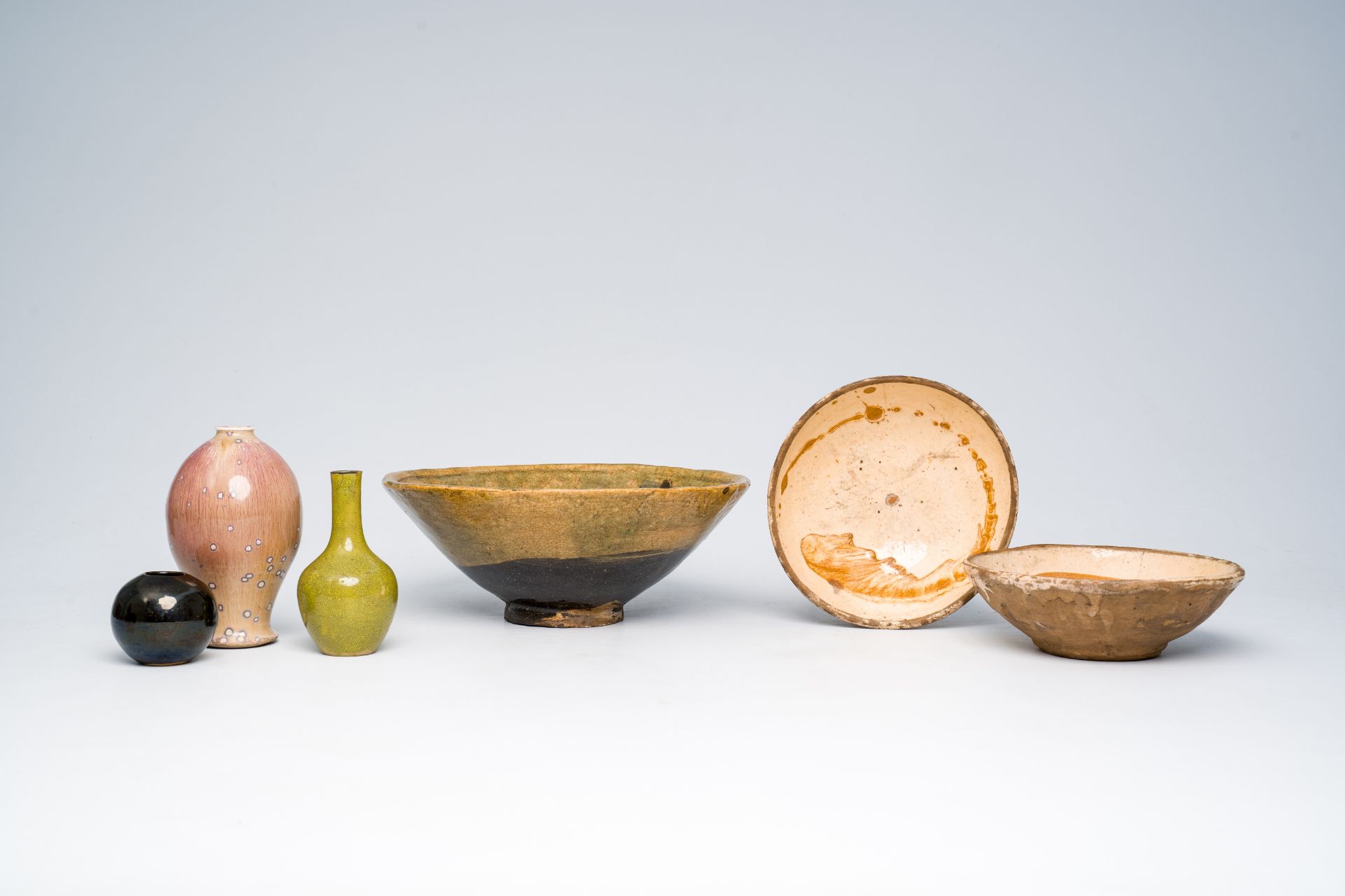 Three Japanese studio pottery bowls and three vases with various glazes, Meiji/Showa, 20th C.