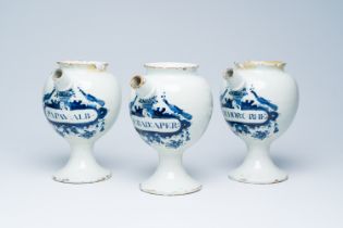 Three Dutch Delft blue and white syrup jars or wet drug jars, 18th C.