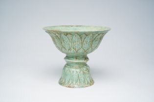 A Thai celadon glazed lotus-shaped footed bowl, probably 17th C.