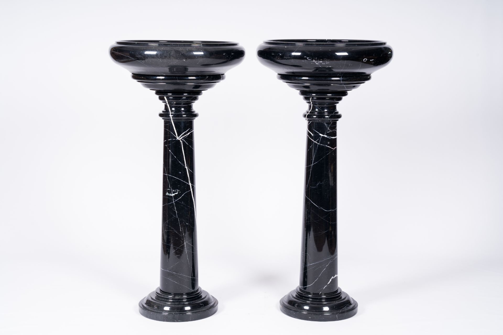 A pair of Italian black-grey marble pedestals crowned with a bowl, 20th C. - Image 2 of 6