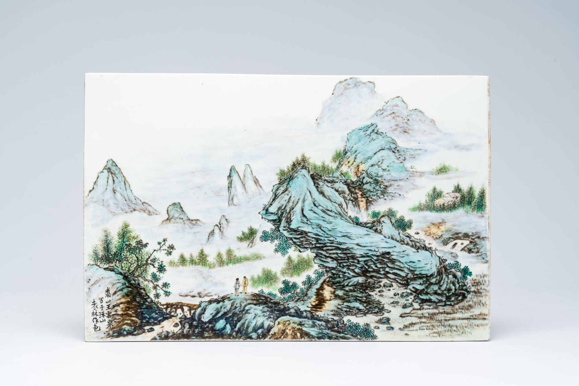 A Chinese qianjiang cai 'animated mountainous landscape' plaque, Republic, 20th C.