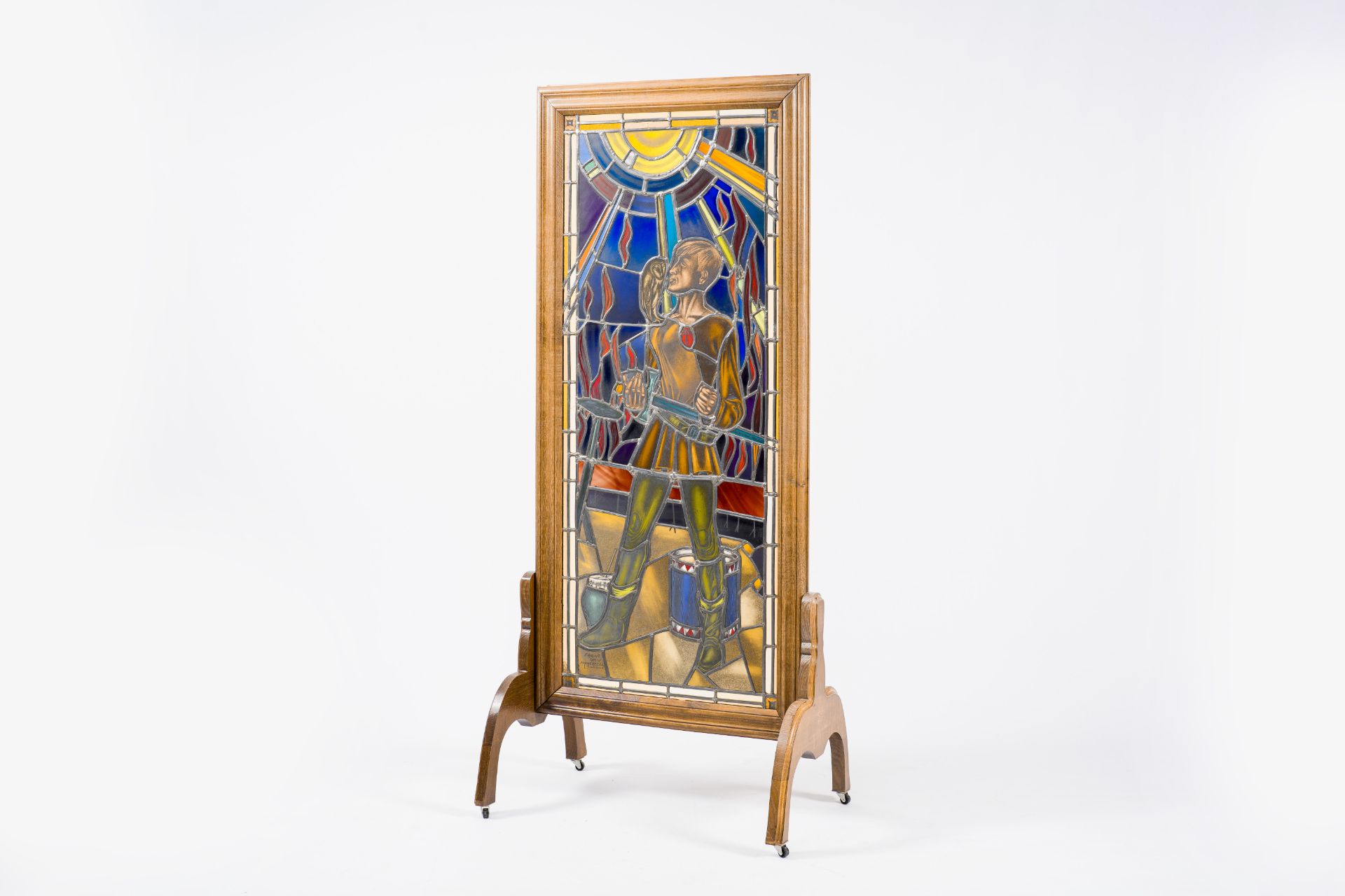 Frans Van Immerseel (1909-1978): A painted and stained glass 'Till Eulenspiegel' window in a wood fr