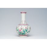 A Chinese famille rose bottle shaped vase with floral design, Hongxian mark, 20th C.