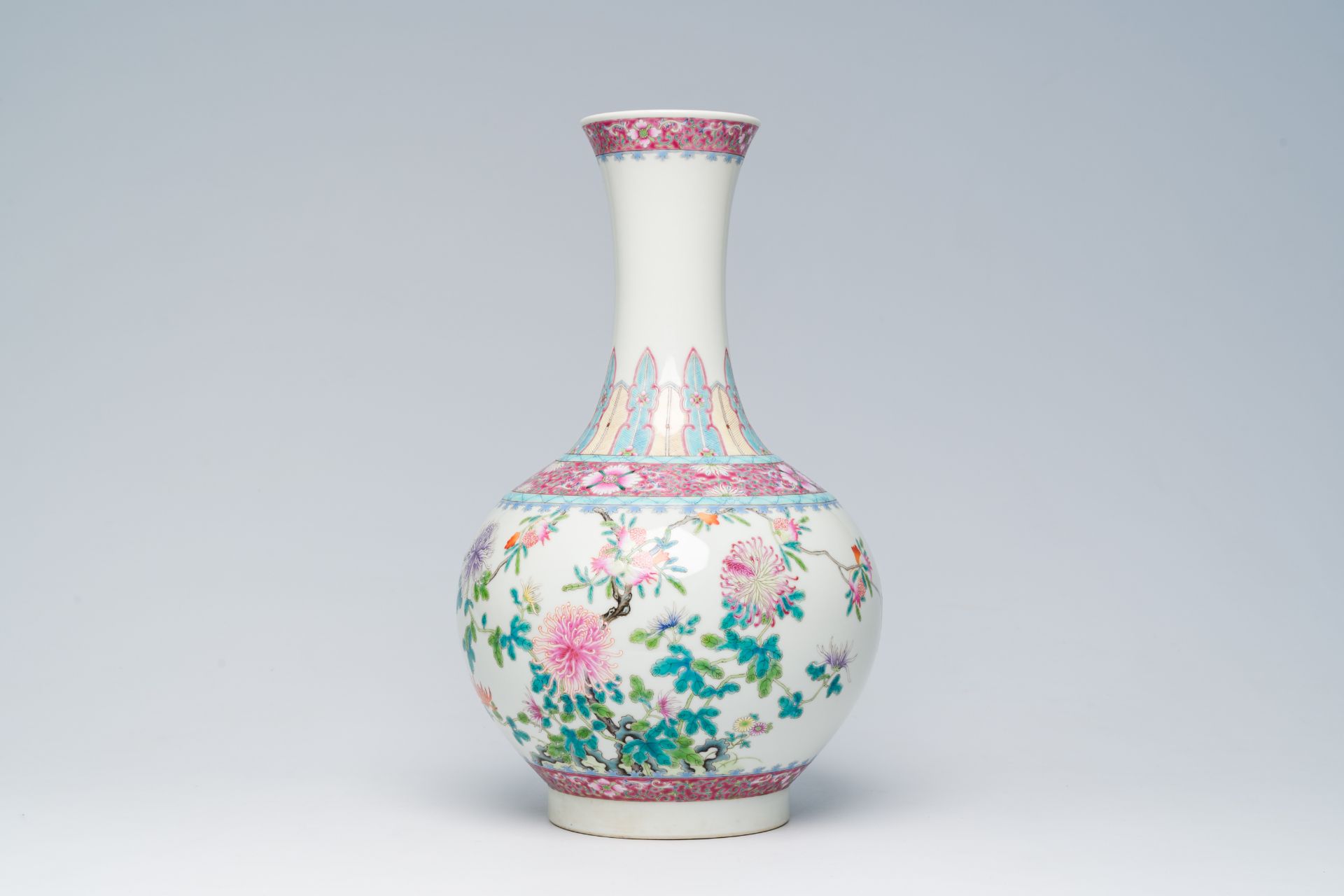 A Chinese famille rose bottle shaped vase with floral design, Hongxian mark, 20th C.