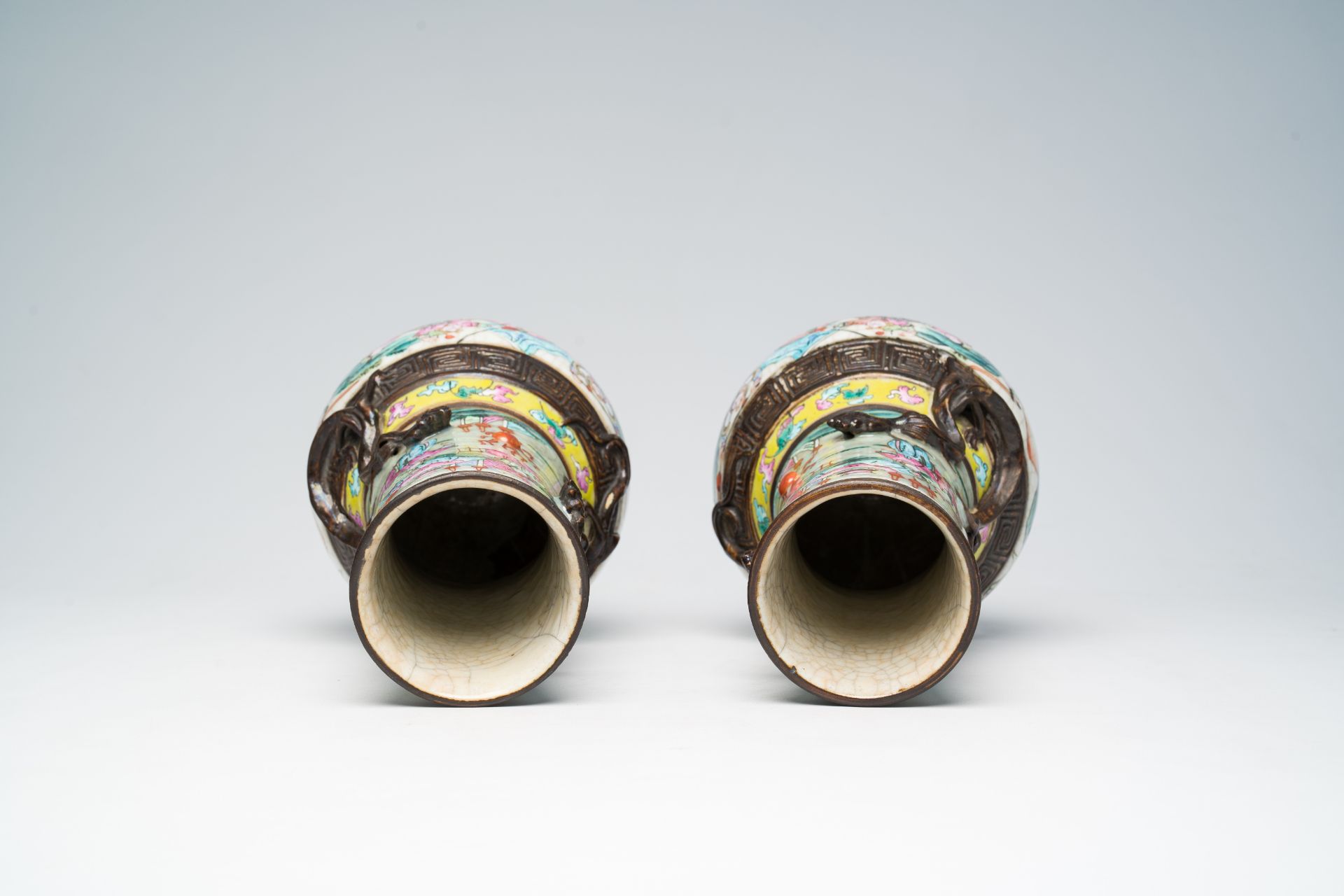 A pair of Chinese Nanking crackle glazed famille rose 'warrior' vases with dragons chasing the pearl - Image 5 of 6