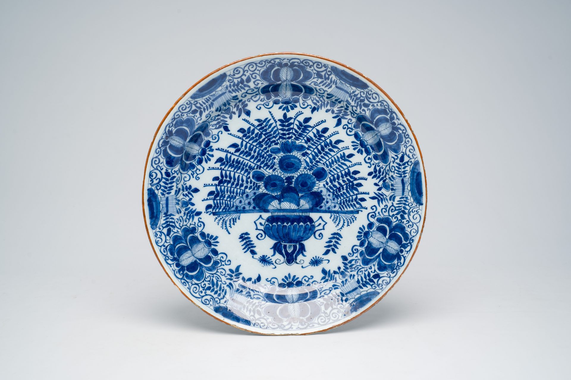 Four Dutch Delft blue and white 'peacock tail' plates and dishes and a tobacco jar, 18th C. - Image 9 of 12