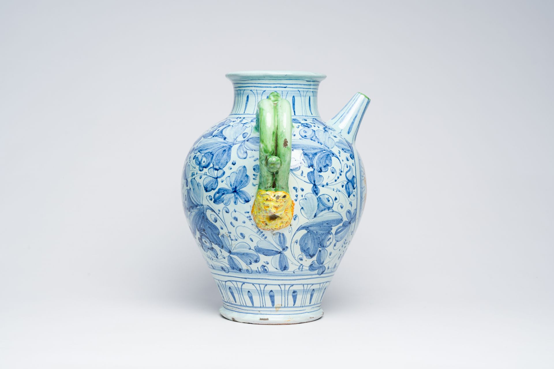 A large Italian polychrome maiolica pharmacy jar with a coat of arms and floral design, possibly 17t - Image 5 of 7