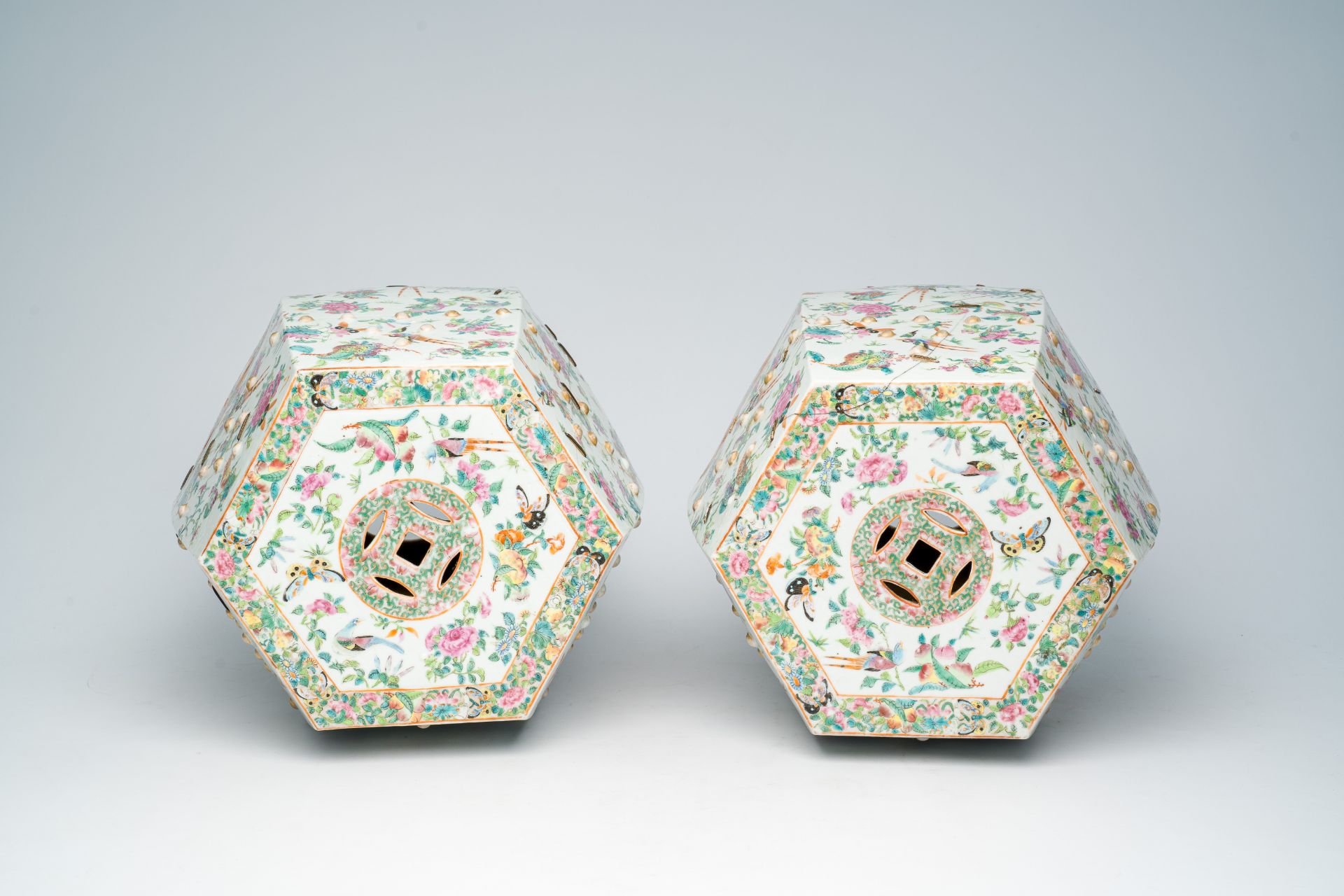 A pair of Chinese Canton famille rose hexagonal garden seats with birds, butterflies and insects amo - Image 6 of 7