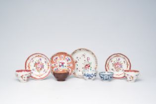 Five Chinese blue, white and famille rose saucers and four cups, 18th C.