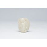 A Chinese white jade pendant with a boy, Qing