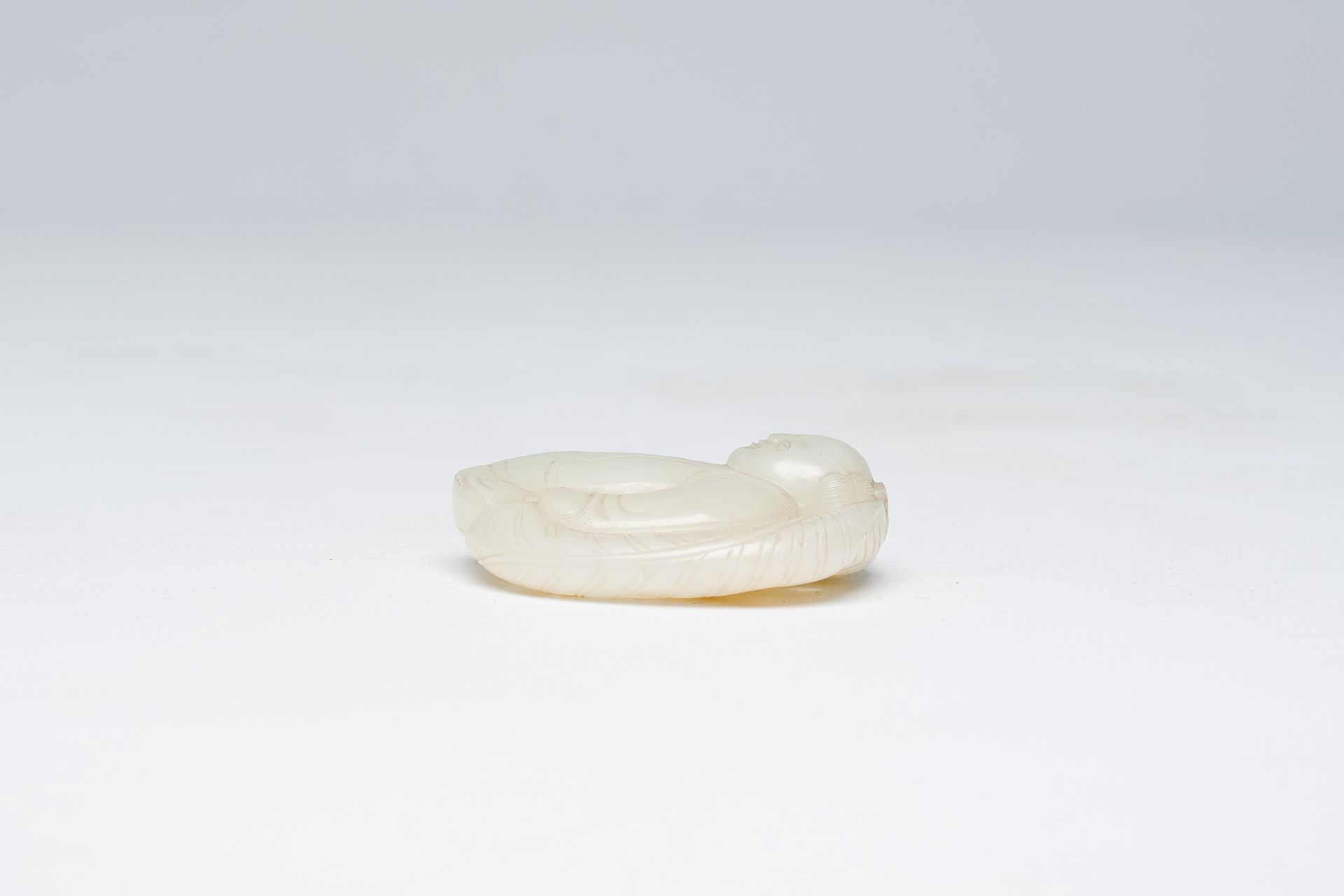 A Chinese white jade pendant with a boy, Qing - Image 3 of 6