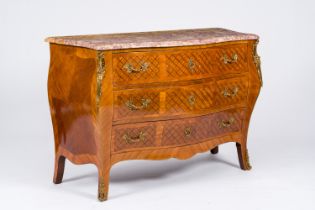 A French gilt bronze mounted wood curved chest of drawers with marble top, 19th/20th C.