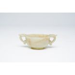 A Chinese celadon jade two-handled bowl, 18th C.