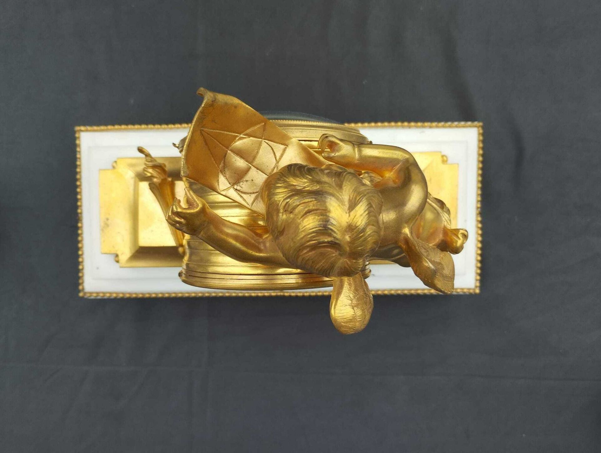 A French gilt bronze mounted white marble three-piece clock garniture with putti, 19th C. - Image 27 of 33