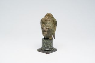 A bronze head of Buddha, Burma, probably 16th C.