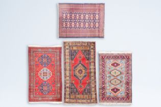 Four various Caucasian rugs with geometric design, a.o. a cloudband 'Chondzoresk Kazak' rug, wool on
