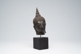 A Thai bronze Sukhothai style head of Buddha, probably 16th/17th C.