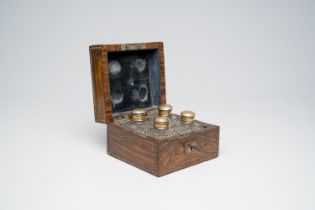 A French veneered wood perfume case with four hand cut flasks, 19th C.