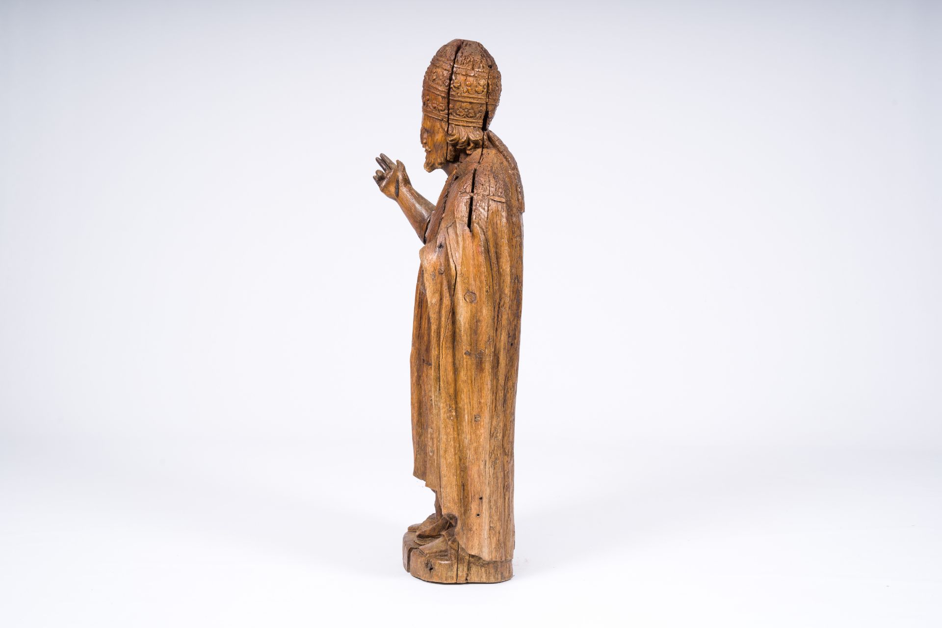 A carved wood blessing figure with papal tiara, 17th/18th C. - Image 3 of 7