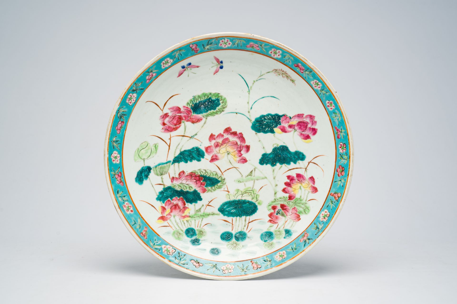 A Chinese famille rose 'lotus pond' dish, 19th C.