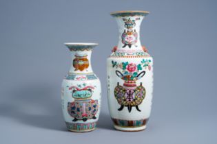 Two Chinese famille rose 'antiquities and flower basket' vases, 19th C.