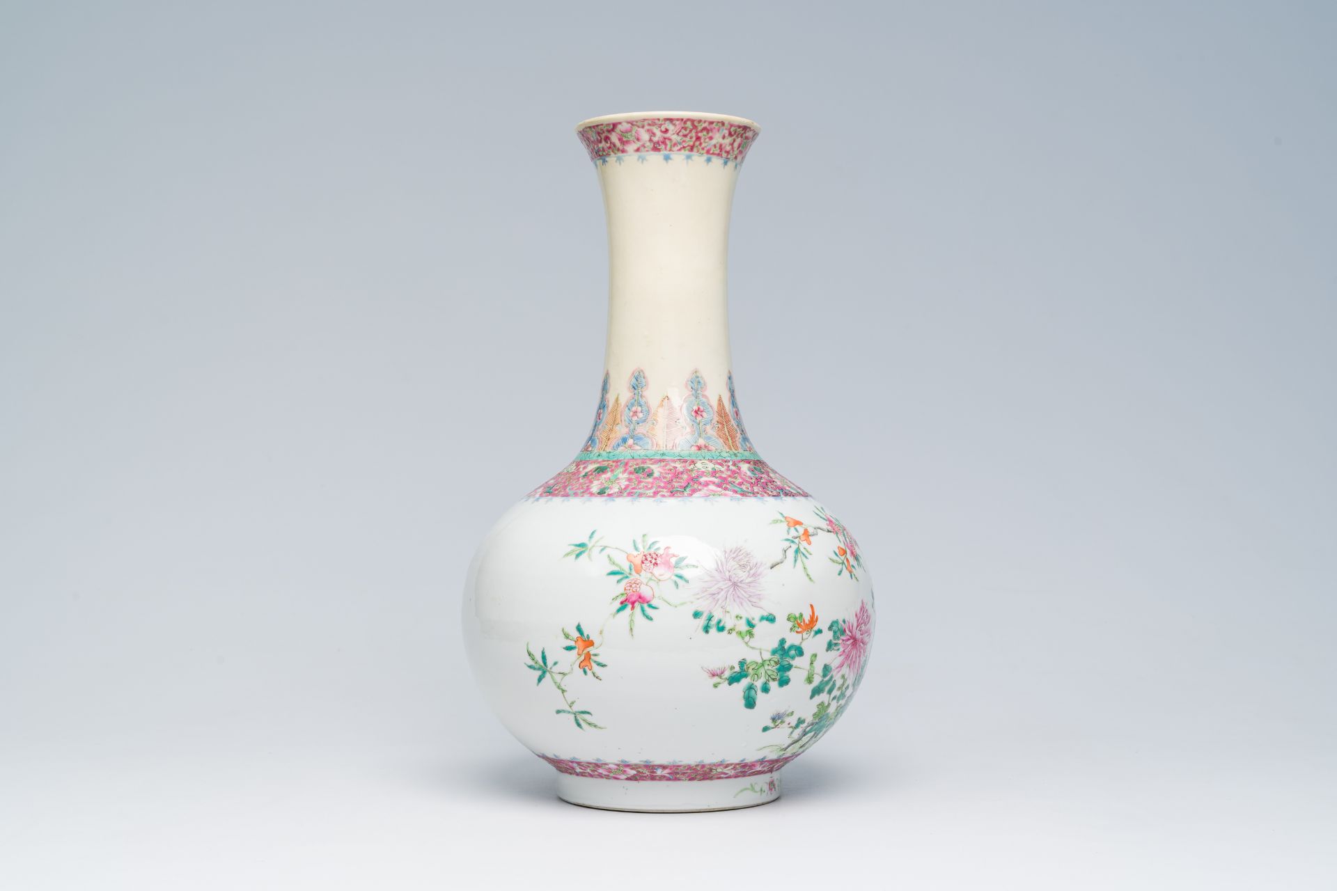 A Chinese famille rose bottle shaped vase with floral design, Hongxian mark, 20th C. - Image 4 of 6