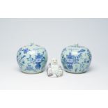 A pair of Chinese blue and white celadon ground 'antiquities' ginger jars and a famille rose figure