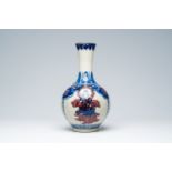 A Chinese bottle shaped crackle glazed blue, white and copper-red 'deities' vase, Yongzheng mark, 19
