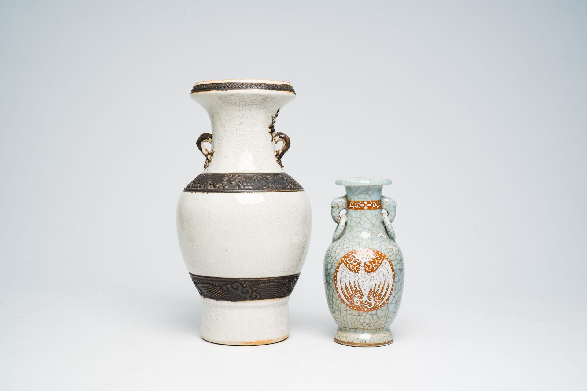 A Chinese Nanking crackle glazed vase with relief design and a polychrome celadon crackle glazed 'ph