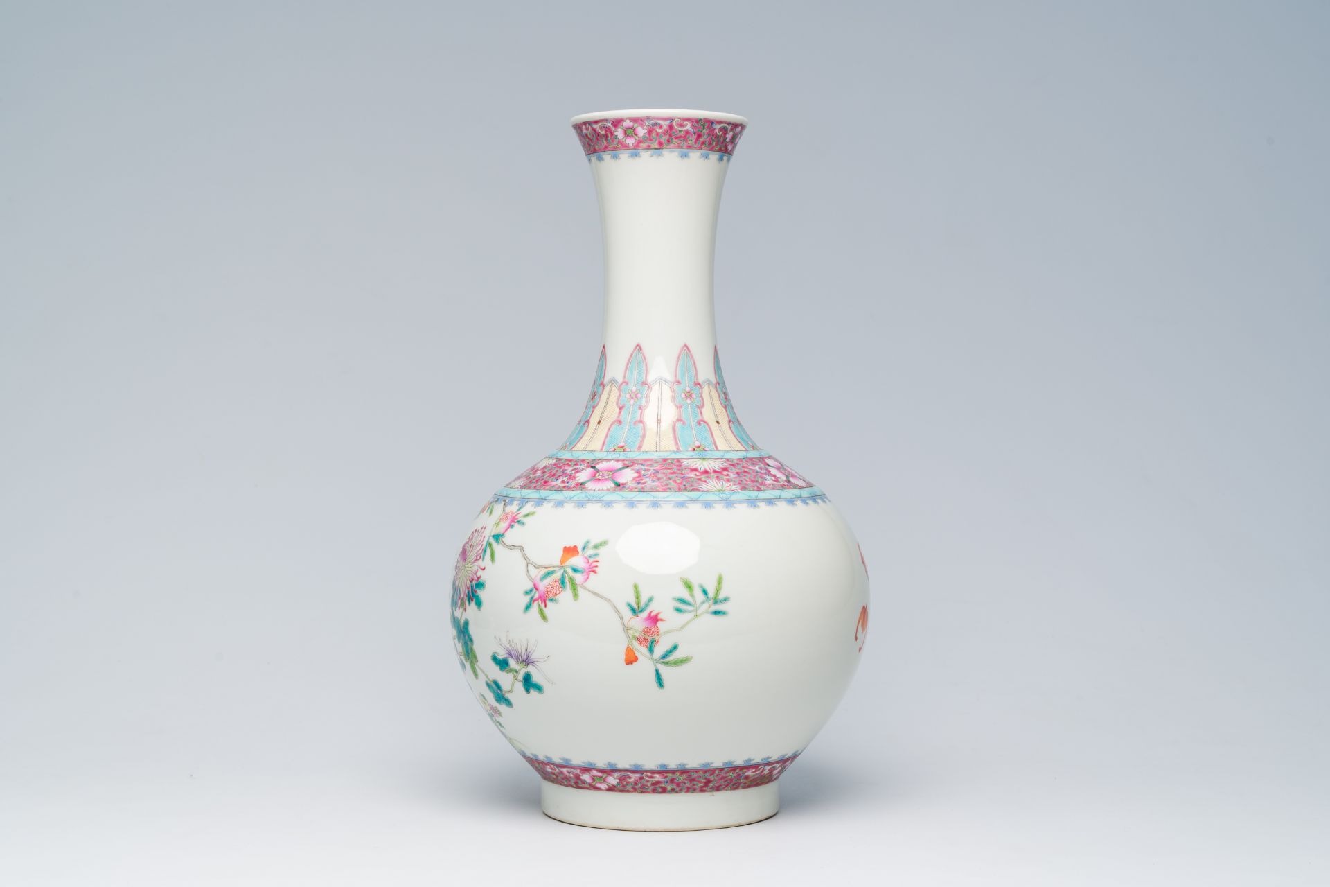 A Chinese famille rose bottle shaped vase with floral design, Hongxian mark, 20th C. - Image 2 of 6