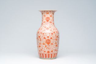 A Chinese iron-red 'lotus scrolls' vase, 19th C.