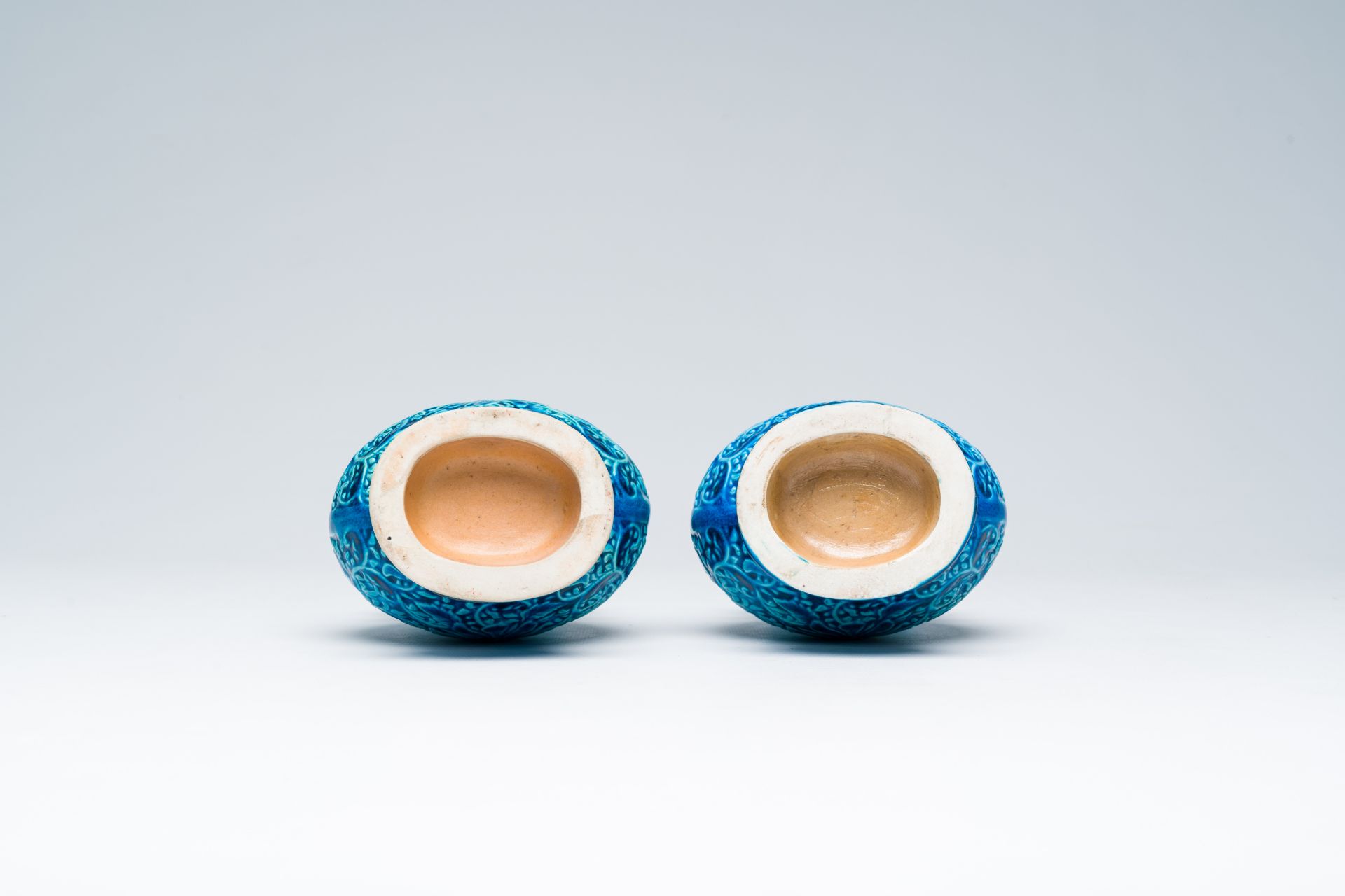 A pair of Chinese turquoise glazed 'lotus' vases, Republic, 20th C. - Image 6 of 6