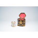 A Chinese hexagonal export Canton black- and gold-lacquer tea box with a matching famille rose teapo