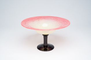 A French Schneider polychrome glass vase on stand with a deep pink rim and mottled yellow interior,
