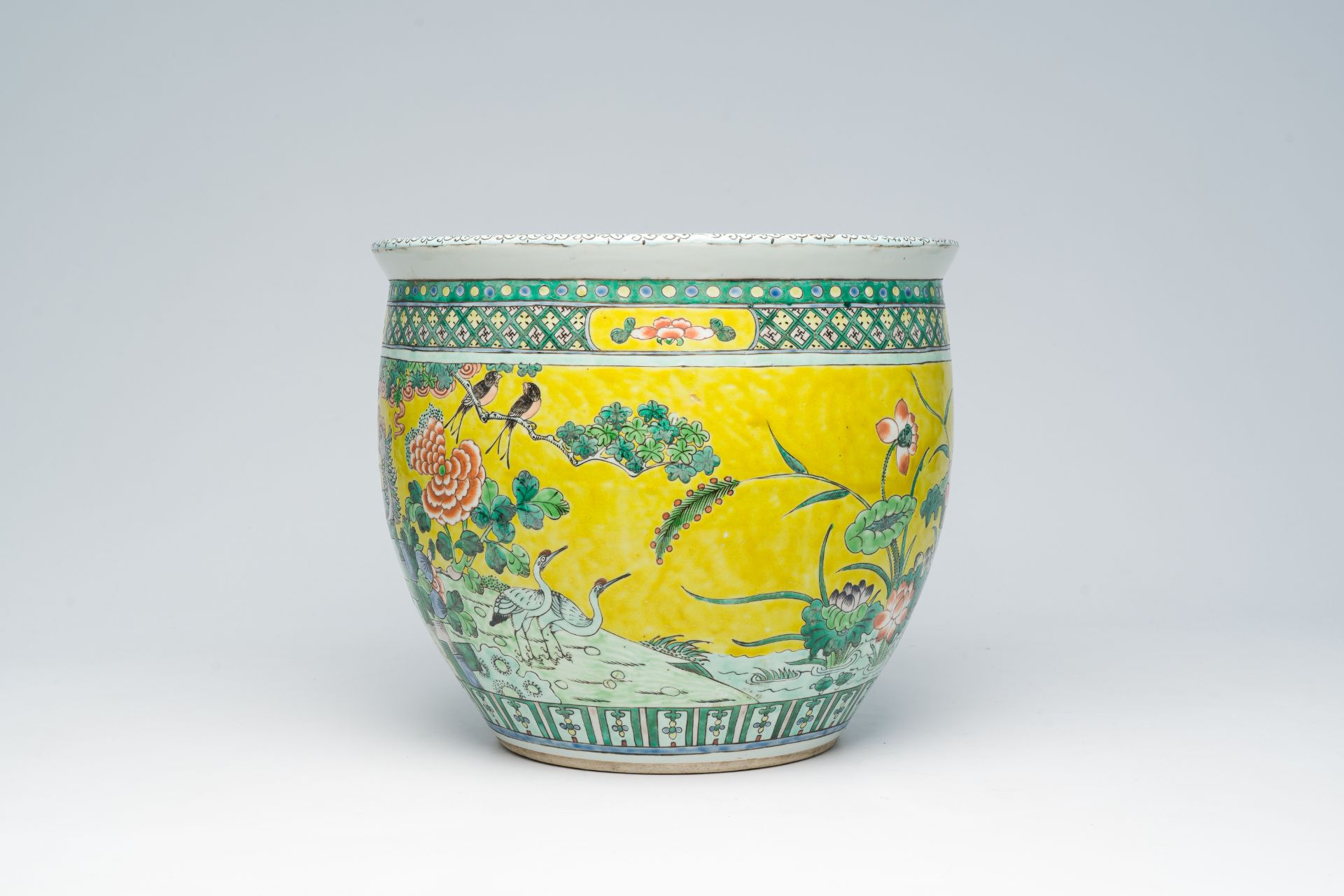 A Chinese famille verte jardiniere with birds among blossoming branches, 19th C. - Image 3 of 7