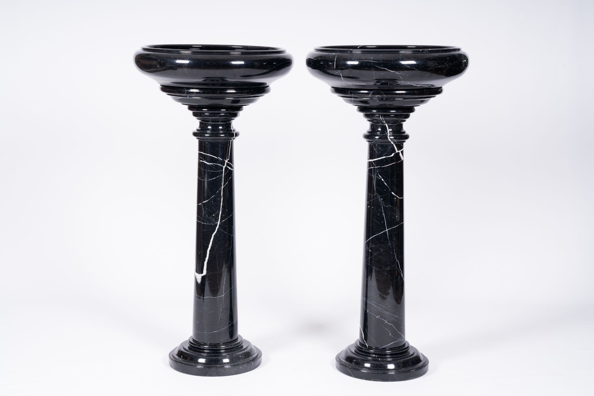 A pair of Italian black-grey marble pedestals crowned with a bowl, 20th C. - Image 4 of 6