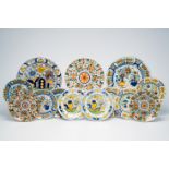 Thirteen Dutch Delft polychrome plates and dishes with floral design, 18th C.