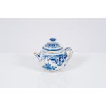 A Dutch Delft blue and white teapot and cover with floral design, 18th C.