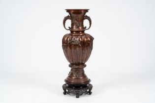 A Japanese bronze vase with engraved and relief design, Meiji, ca. 1900