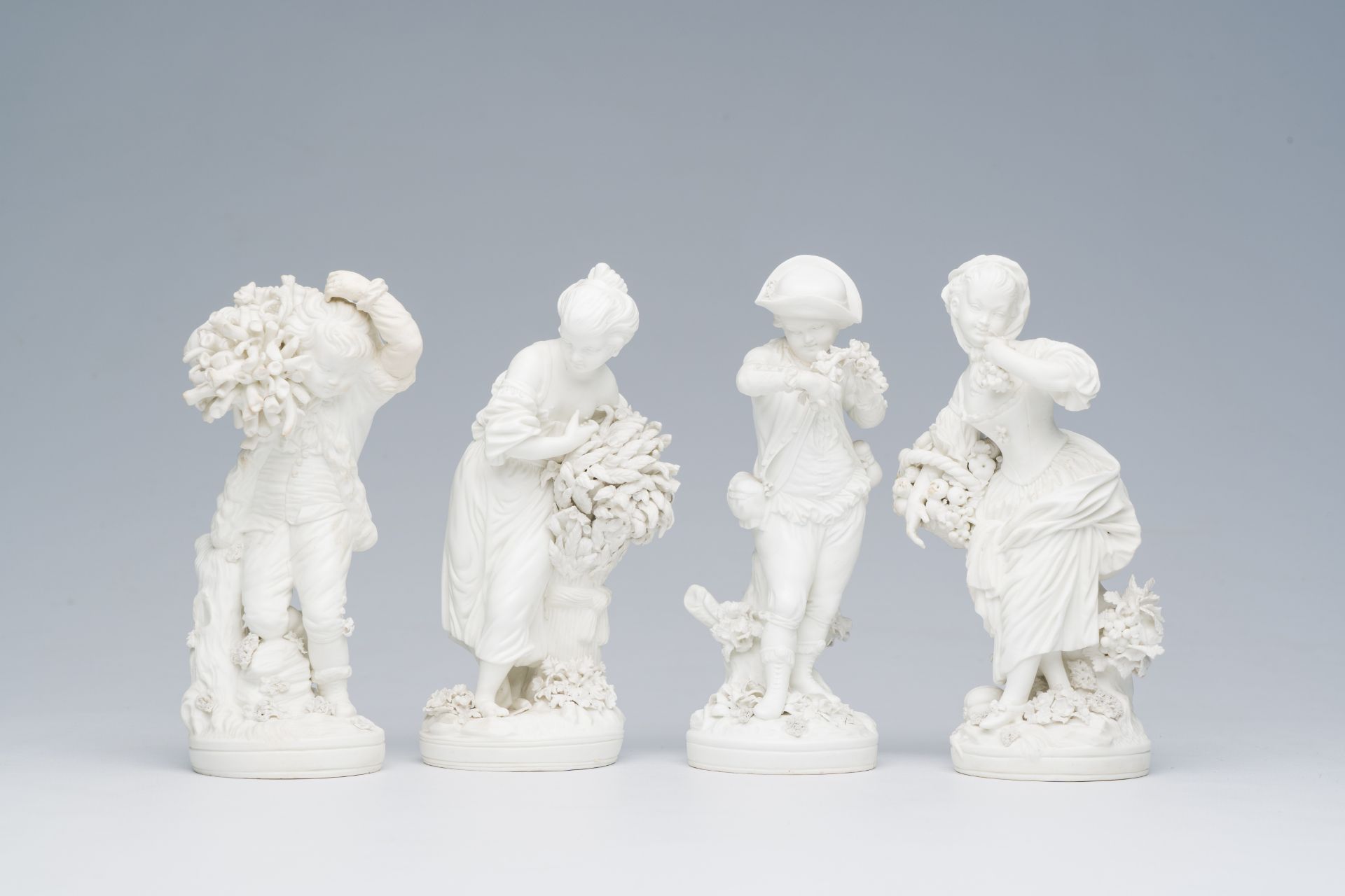 Four fine English biscuit figures depicting the 'four seasons', 19th C.