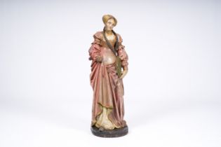 A German carved and polychrome painted wood 'noble lady with a book' figure, 19th C.